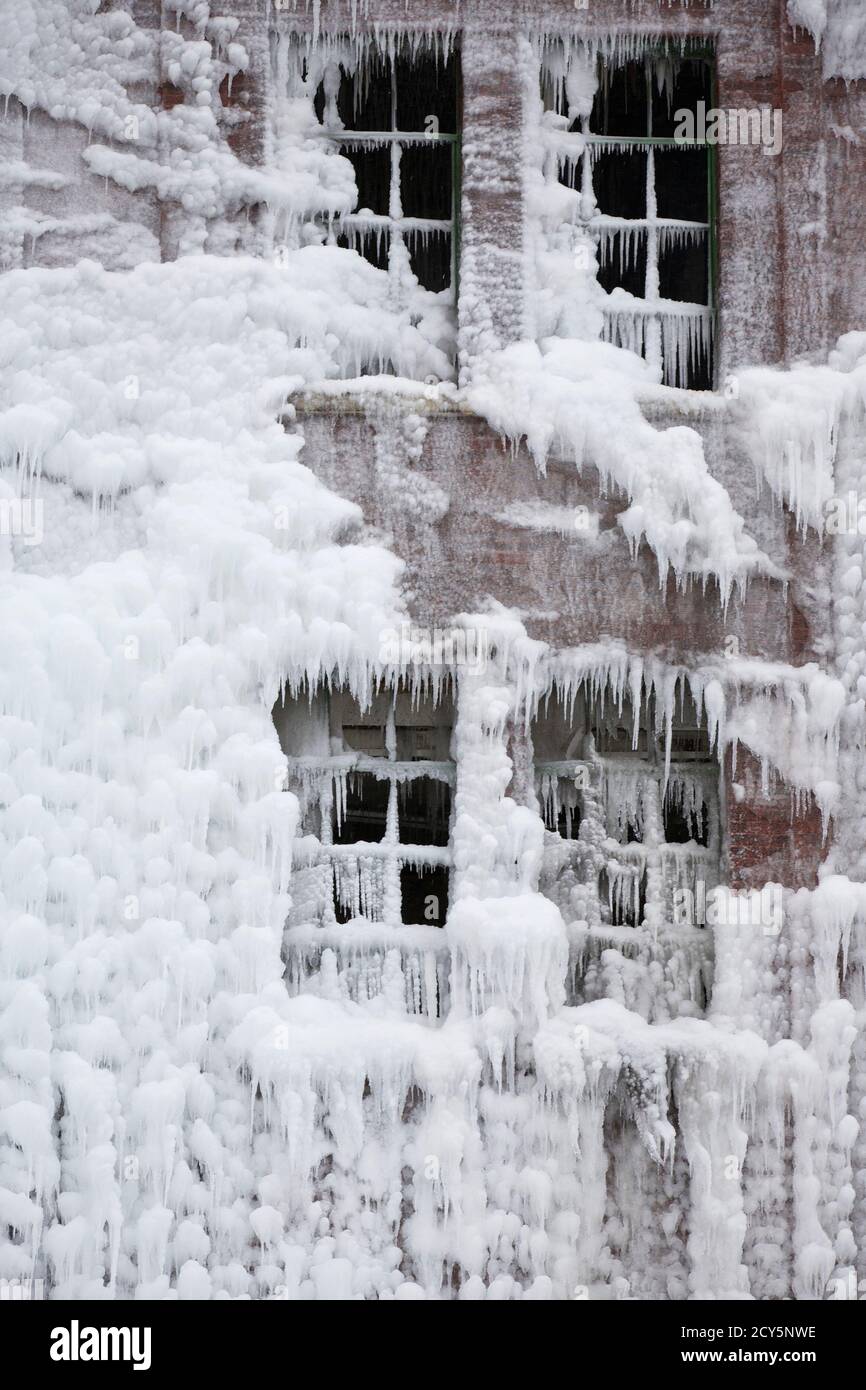 Ice covers a warehouse that caught fire Tuesday night, in Chicago January  23, 2013. Fire department officials said it is the biggest fire the  department has had to battle in years and