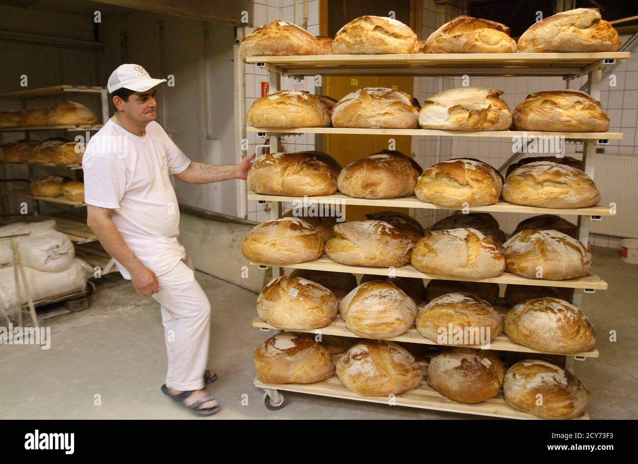 A Baker Pulls A Trolley Loaded With Freshly Baked Bread In The Lipoti Bakery In Budapest November 3 2011 The Lipoti Bakery Started As A Small Family Venture In 1992 In Lipot