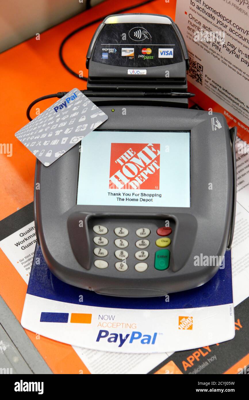 A PayPal card sits at a cashier station at a Home Depot store in Daly City,  California, February 21, 2012. EBay Inc, which owns PayPal, has set a  public goal of 20