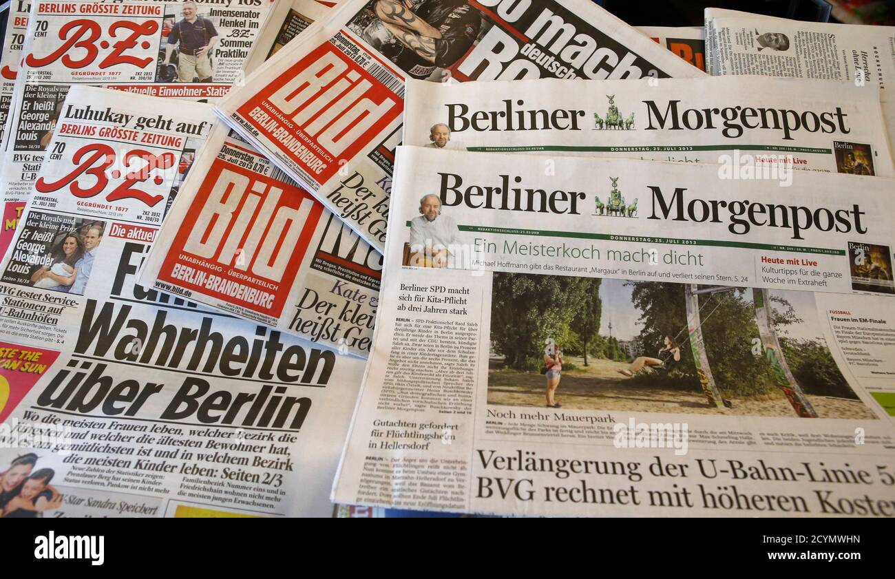 Copies of the German newspaper 'B.Z.', 'Bild' and 'Berliner Morgenpost' of  German publisher Axel Springer are pictured in a newspaper shop in Berlin  July 25, 2013. German publisher Axel Springer agreed a