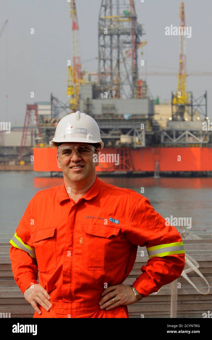 Johnathan Roberts, operations manager of S.D. Standard Drilling Plc., poses  for photo on an oil drilling rig being built at the Keppel FELS shipyard in  Singapore October 12, 2012. Slightly over twenty