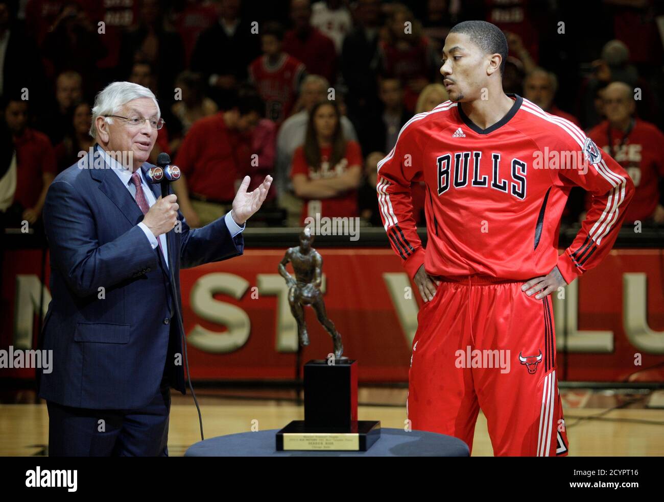 NBA Commissioner David Stern (L) talks about Derrick Rose of the Chicago  Bulls during the Maurice Podoloff Trophy presentation as the winner of  2010-11 Kia NBA's Most Valuable Player before the start