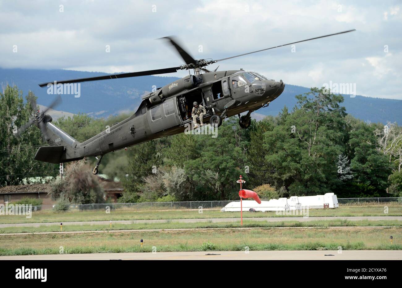 A National Guard Helicopter Lands At Boulder Municipal Airport After  Ferrying Supplies And Rescue Personnel To Mountain Towns That Have Been Cut  Off By The Flooding In Boulder, Colorado September 13, 2013.