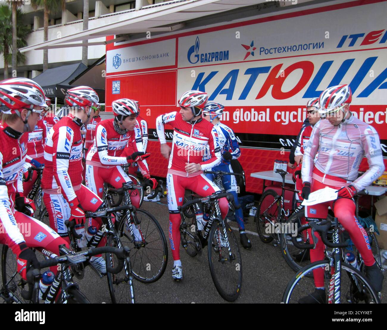 Denis Menchov (4th R) talks with his team mates from the Katusha Russia  global cycling project during training in Palma de Mallorca January 17,  2012. Missing last year's Tour de France has