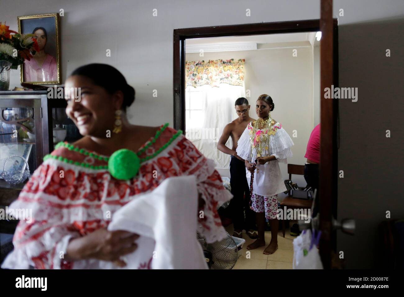 Women wearing traditional clothing known as "Pollera" get ready to take  part in the annual Thousand Polleras parade in Las Tablas, in the province  of Los Santos January 10, 2015. According to