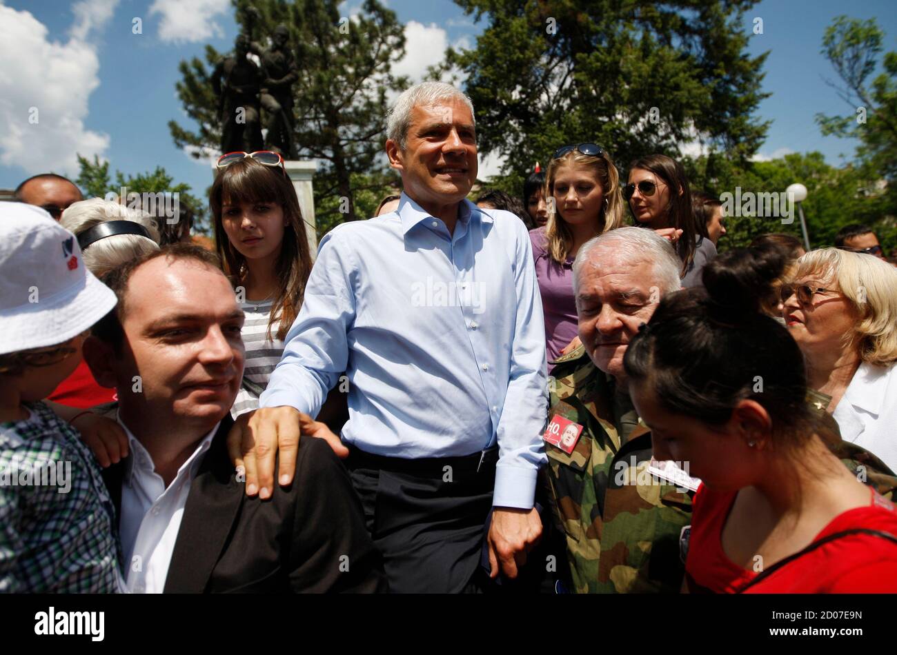 Former Serbian President and Democratic Party leader Boris Tadic reacts as  he is surrounded by supporters during a campaign rally in the southern town  of Prokuplje May 10, 2012. Serbia's main opposition