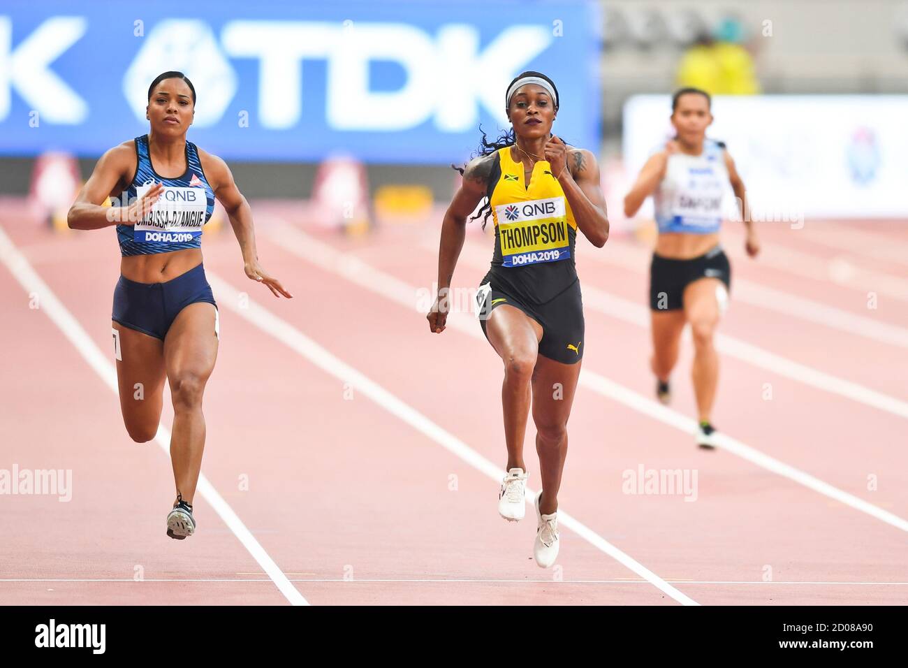 Elaine Thompson (Jamaïque), Orlann Ombissa-Dzangue (France). 100 mètres, rond 1. Championnats du monde d'athlétisme de l'IAAF, Doha 2019 Banque D'Images