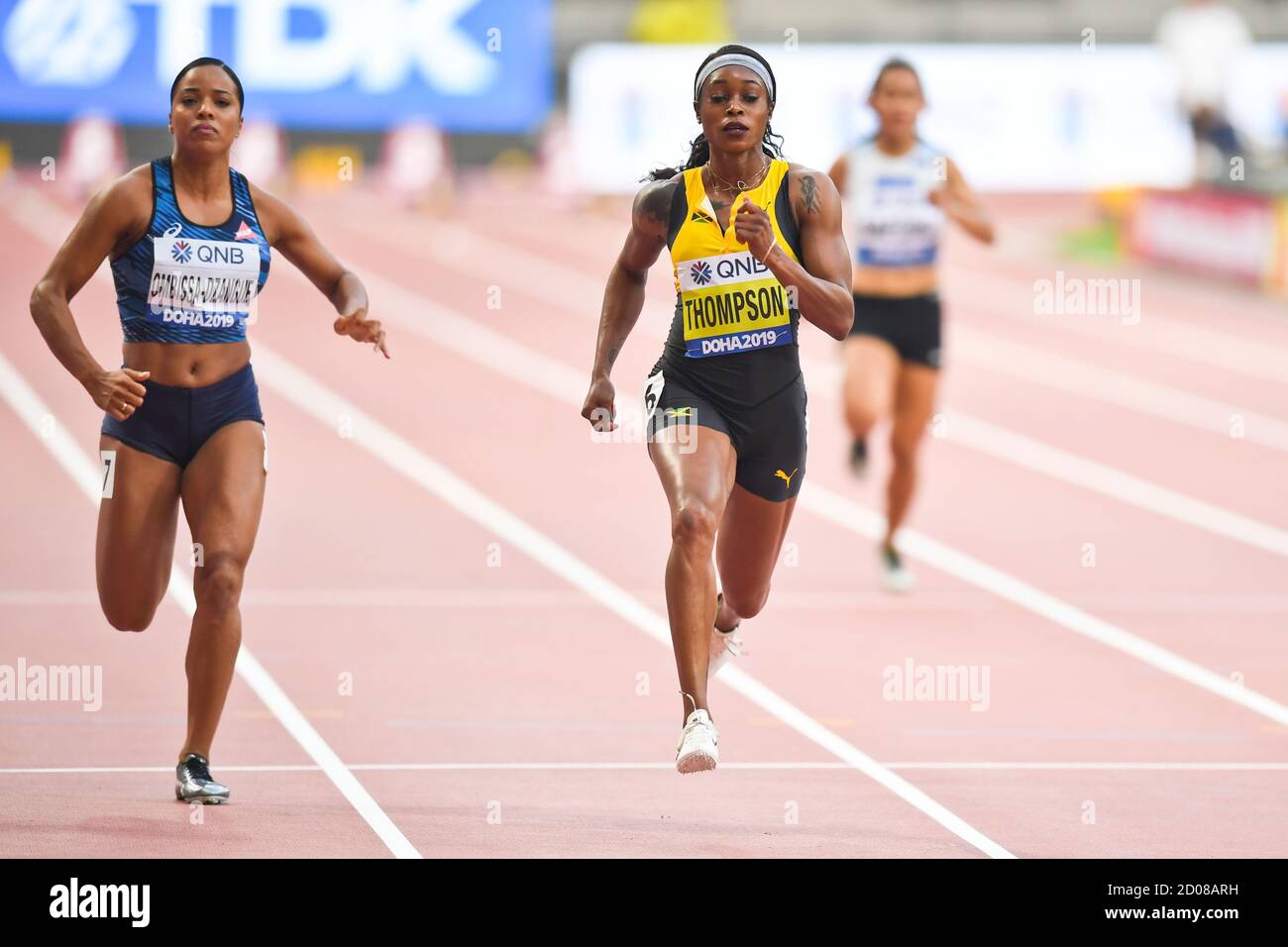 Elaine Thompson (Jamaïque), Orlann Ombissa-Dzangue (France). 100 mètres, rond 1. Championnats du monde d'athlétisme de l'IAAF, Doha 2019 Banque D'Images