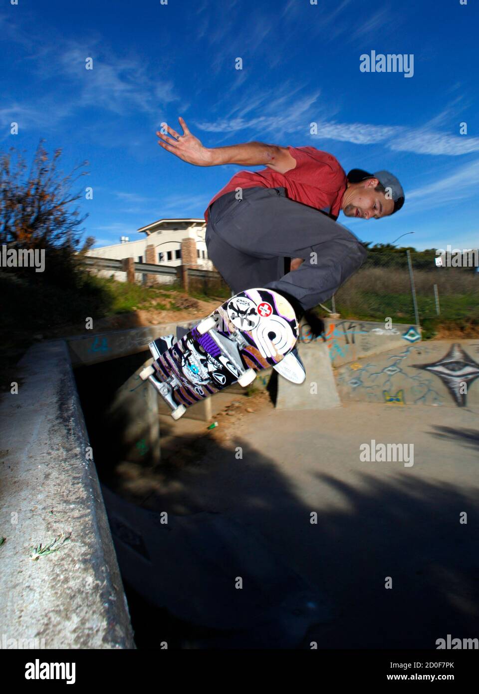 Professional skateboarder Jordan Hoffart of Canada rides in a dry drainage  channel in San Diego, California January 5, 2012. Ever since Jordan Hoffart  decided to turn his back on the seemingly incessant