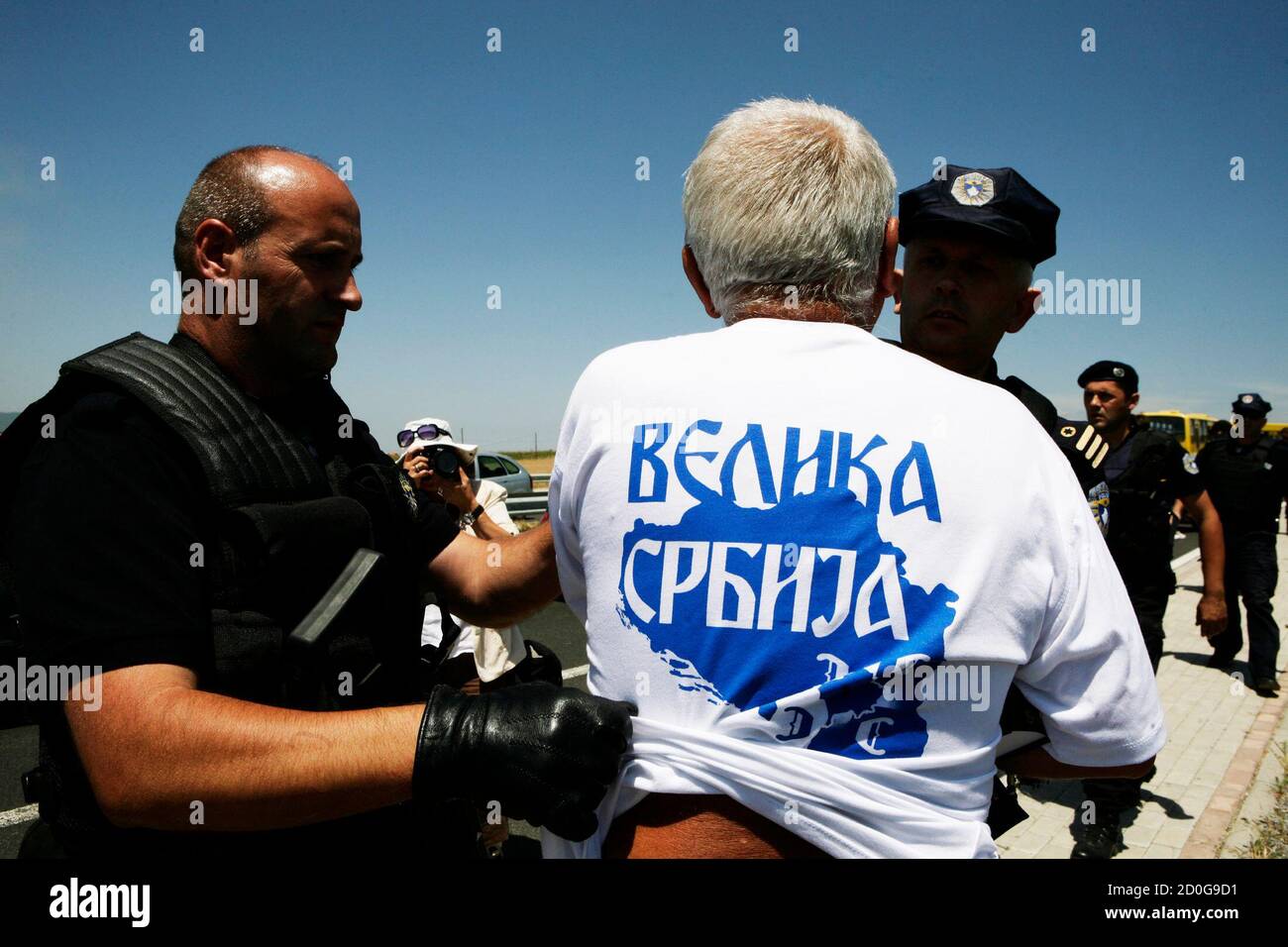 Police arrest a Serb wearing a t-shirt with the words that read, "Great  Serbia" during a celebration commemorating the anniversary of the 1389  Battle of Kosovo at Gazimestan, near the capital Pristina