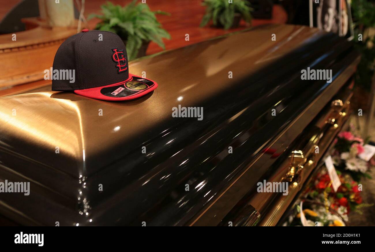 A baseball cap sits on top of the casket of Michael Brown inside Friendly  Temple Missionary Baptist Church before the start of funeral services in  St. Louis, Missouri, August 25, 2014. Family,