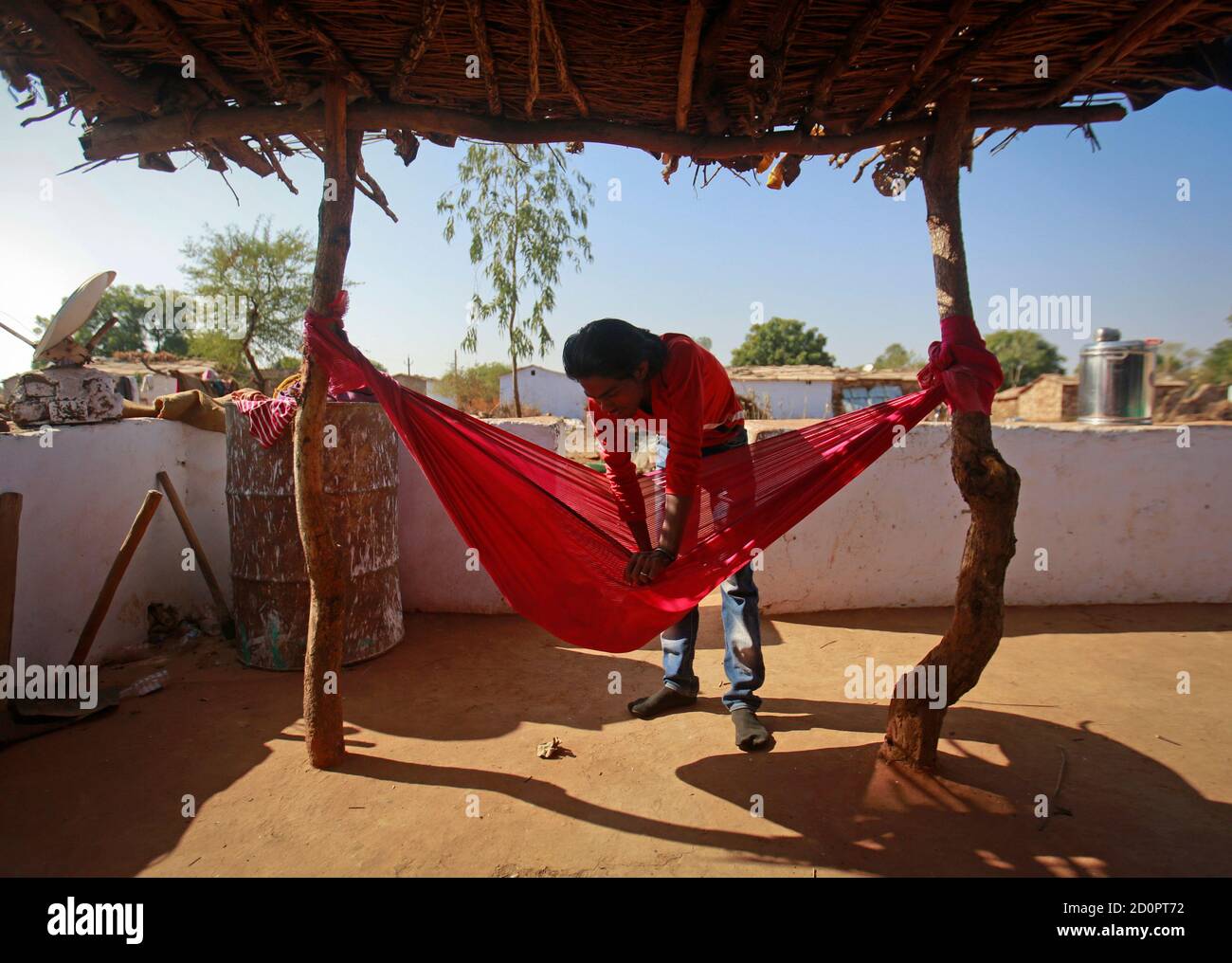 Gopal Kishan 16 Plays With His Four Month Old Baby Alok While Sitting Outside His Wife S House Near Baran Located In The Northwestern State Of Rajasthan January 21 13 Gopal Was Married To His