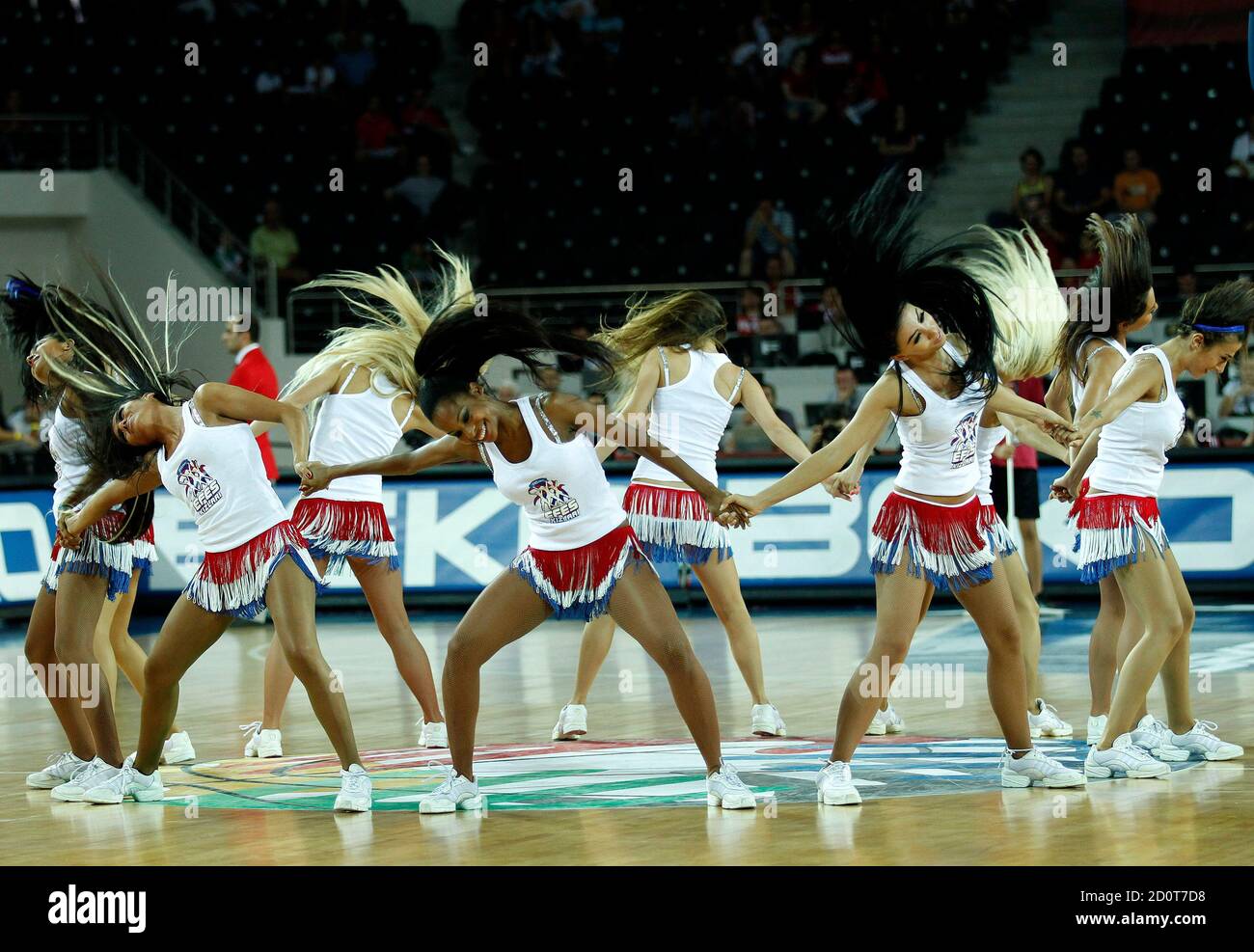 Cheerleaders perform during the FIBA Basketball World Championship game  between China and Russia in Ankara September 1, 2010. The absence of  scantily clad female cheerleaders at recent World Championship basketball  matches involving