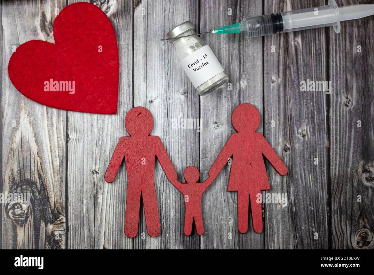 chaîne de papier familiale et vaccin covid-19 Banque D'Images