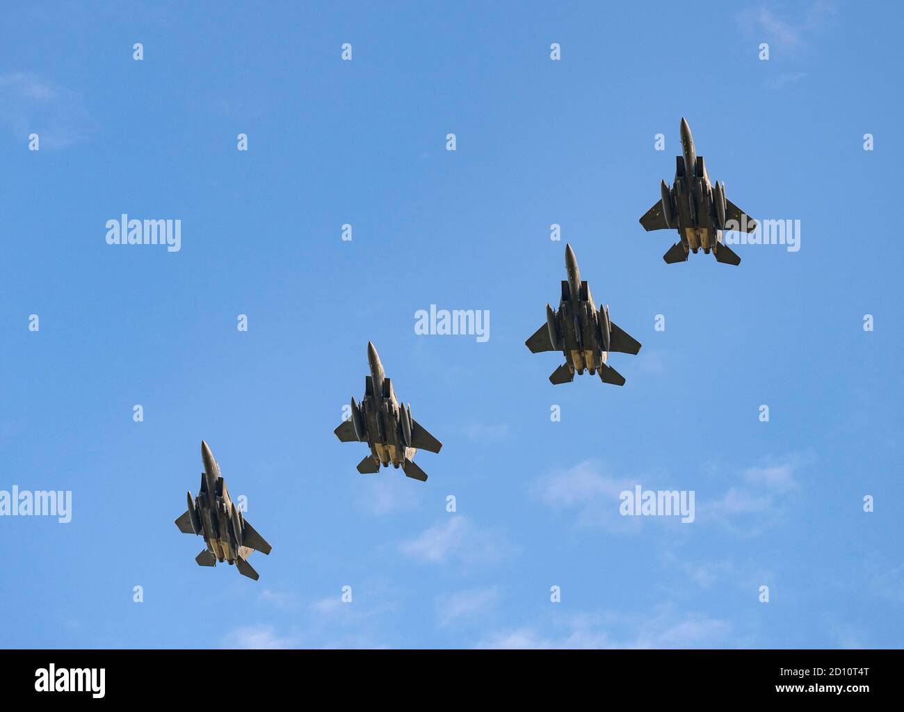 4 navire de F-15 Strike Eagles retournant à la base à RAF Lakenheath Banque D'Images