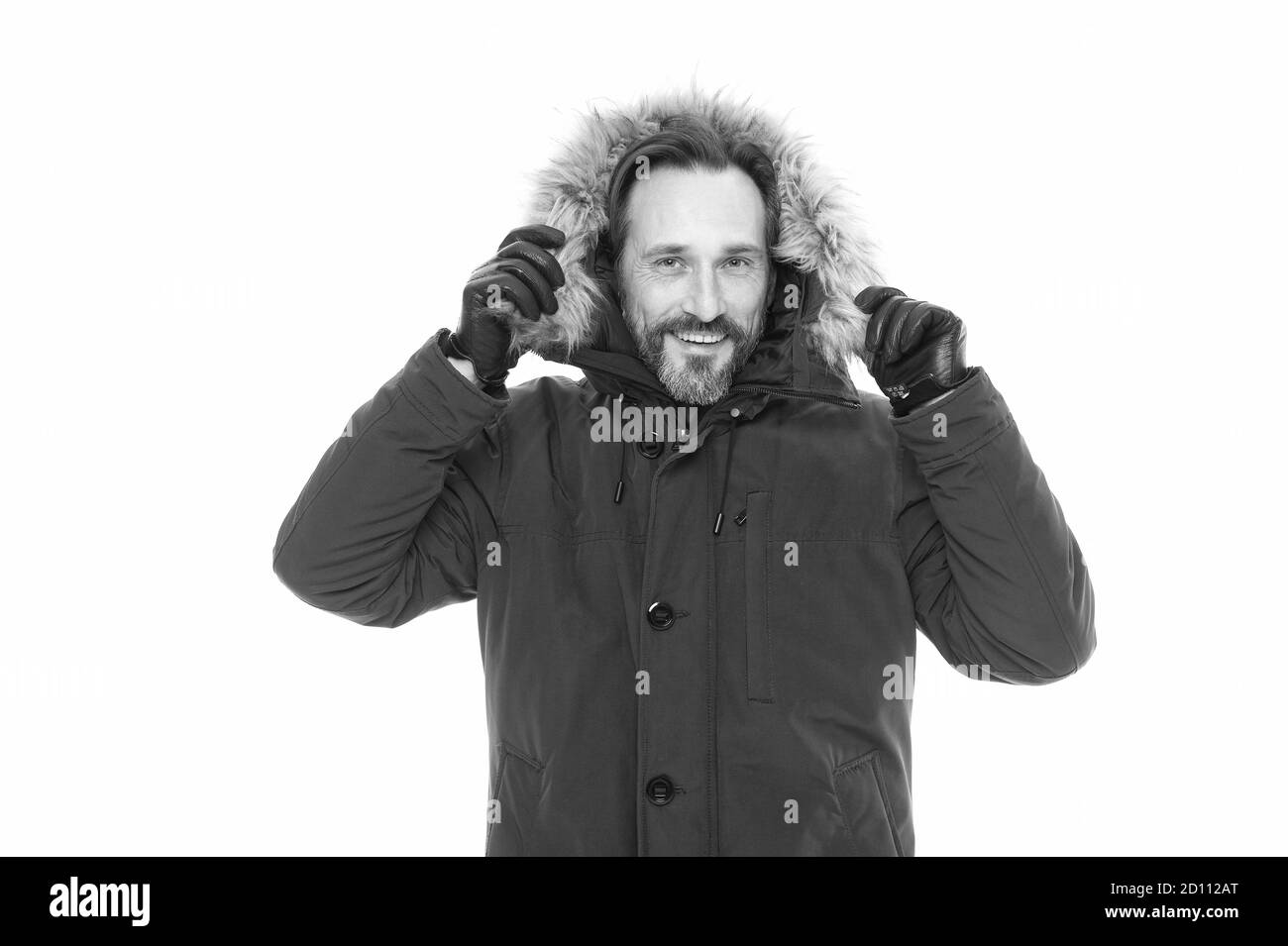 Se sentir proteges. Homme mur par temps froid l hiver style. Man enjoying chaleur et confort. Manteau decontracte pour les conditions froides de l hiver. Beau mec heureux fausse fourrure capot. Collec...