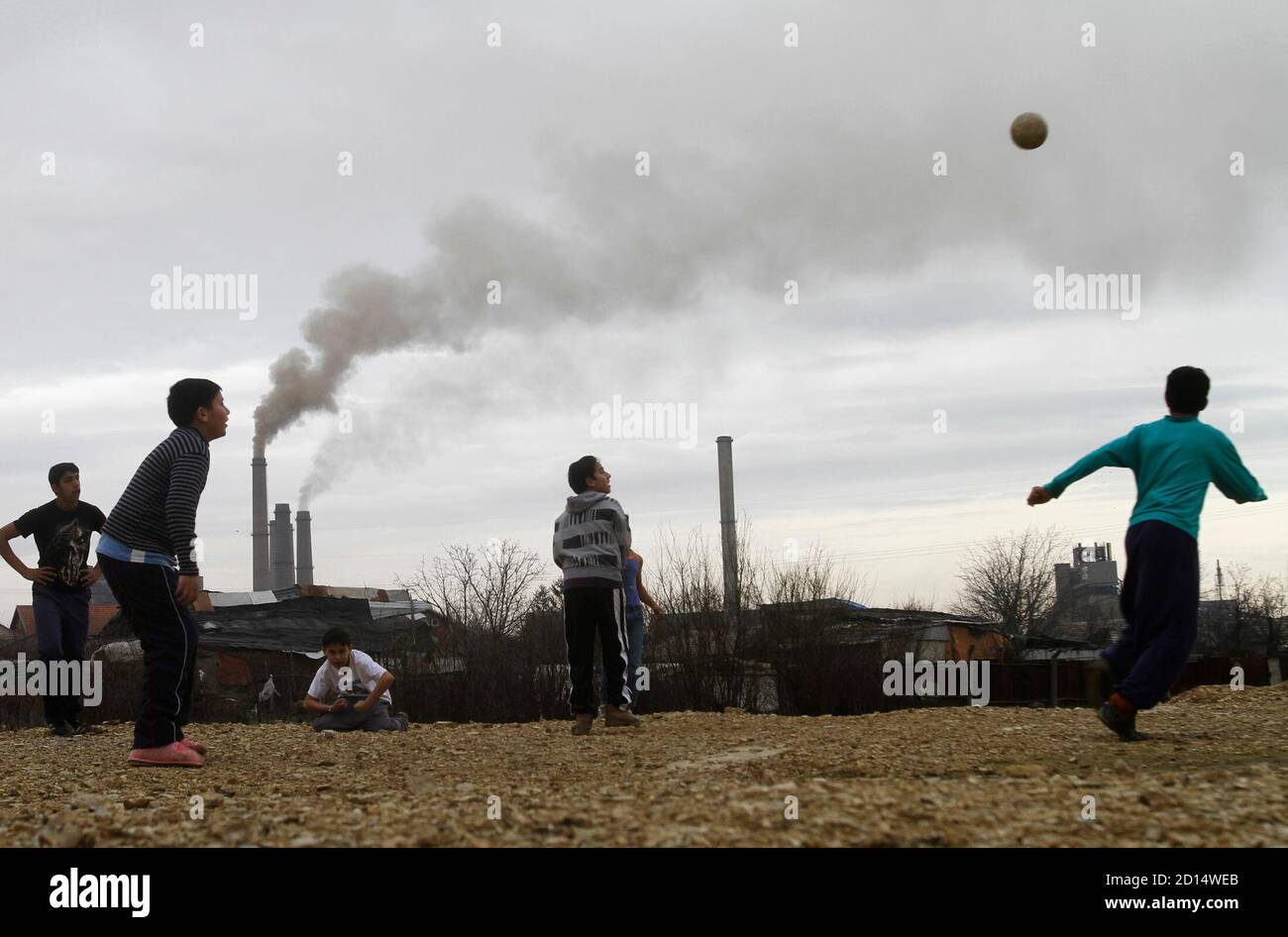 Children Play Near The Chimneys Of The Kosovo A Power Plant Close To Kosovo S Capital Pristina March 1 10 Six International Consortiums Have Expressed Initial Interest In Building A Coal Fired Power Plant