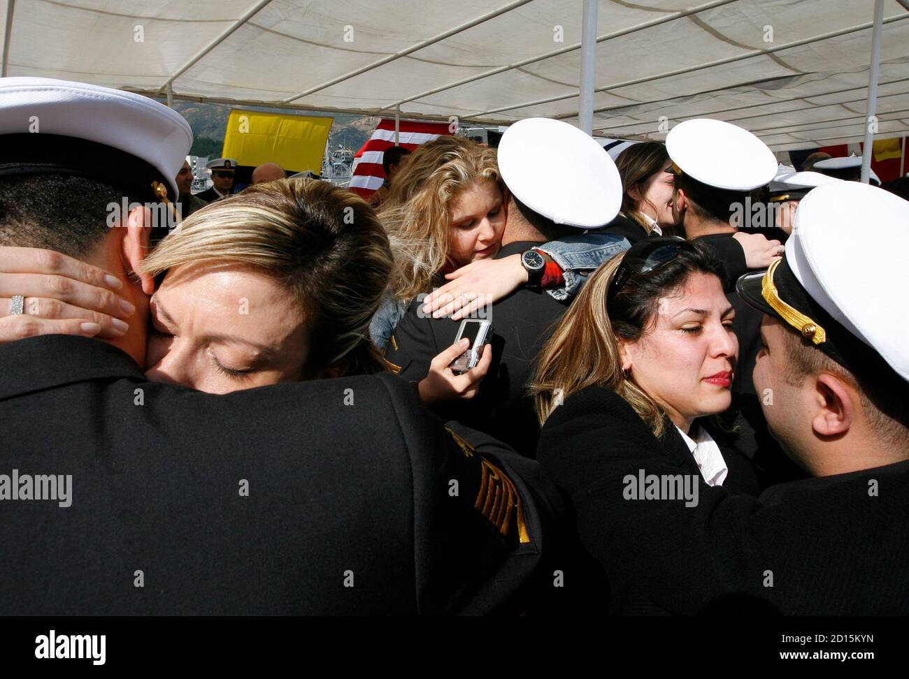 Sailors say goodbye to their spouses during a farewell ceremony for the  Turkish navy ship Giresun in Aksaz Navy Base near coastal town of Marmaris  in Mugla district February 17, 2009. Turkish