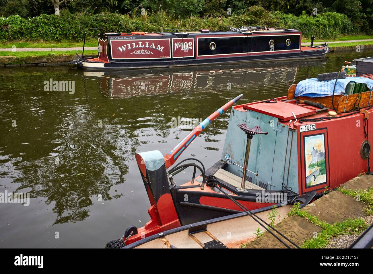 Stowhill construit en style remorqueur narrowboat William avec origianal butty assorti Anne en forground à Lymm à Cheshire Banque D'Images