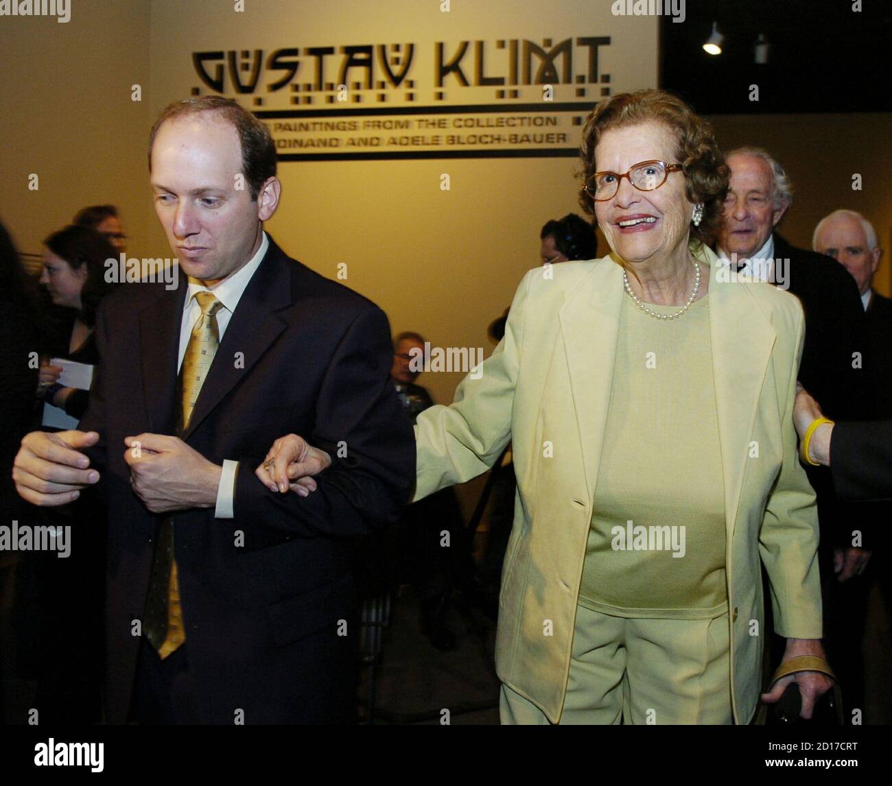 Maria Altmann (R), 90, of Los Angeles, and her attorney E. Randol  Schoenberg (L) leave a special exhibition of five paintings by Austrian  artist Gustav Klimt that were looted by the Nazis