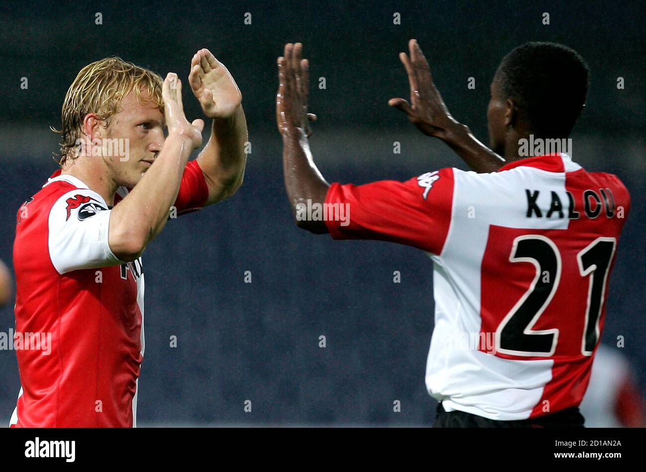 Feyenoord's Kuyt ( ) celebrates with team mate Kalou after scoring against  Rapid Bucharest during UEFA Cup match in Rotterdam. Feyenoord's Dirk Kuyt (  L ) celebrates with team mate Salomon Kalou