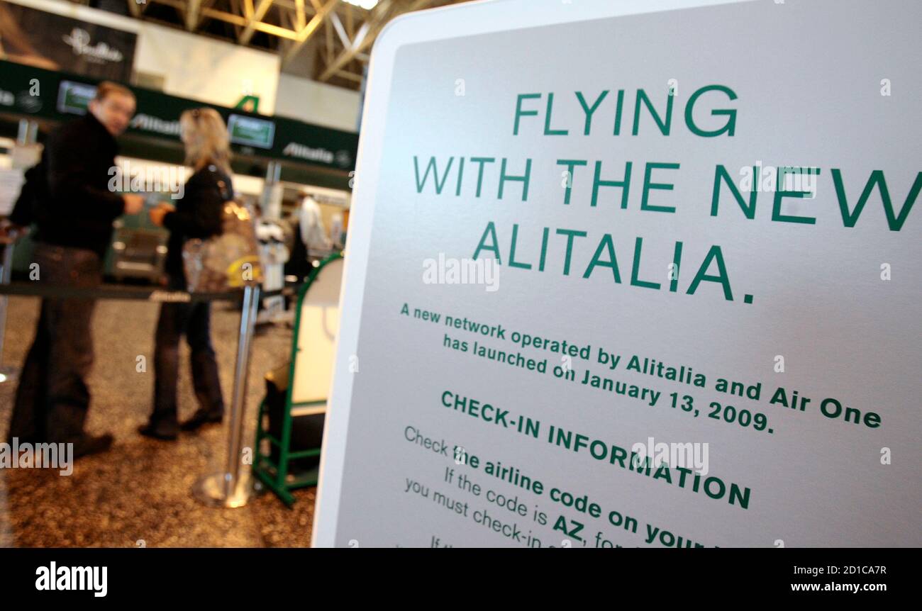 Passengers Check In At An Alitalia Desk At Malpensa Airport Near Milan January 13 2009 Alitalia The Airline That Has Flown Popes And Prima Donnas Took To The Skies As A Revamped