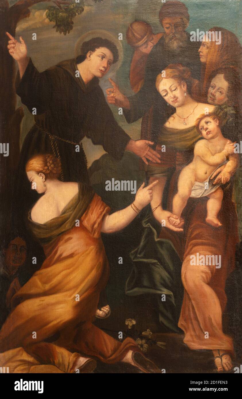 ARCO, ITALIE - 8 JUIN 2018: La peinture de la scène comme Saint Antoine de Padoue rattache le pied du jeune homme dans l'église Collégiata dell'Assunta par u Banque D'Images