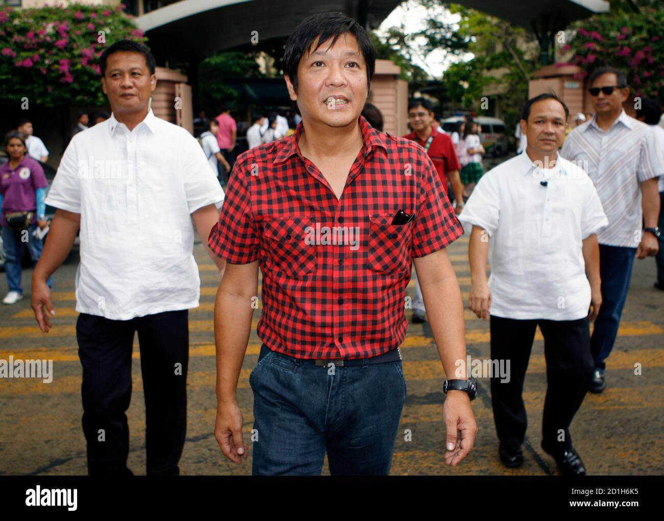 Senatorial Candidate Ferdinand Bongbong Marcos Jr C The Only Son Of Late Dictator Ferdinand E Marcos Walks With Bodyguards During A Campaign In Manila March 18 2010 The Oxford Educated Son Of The