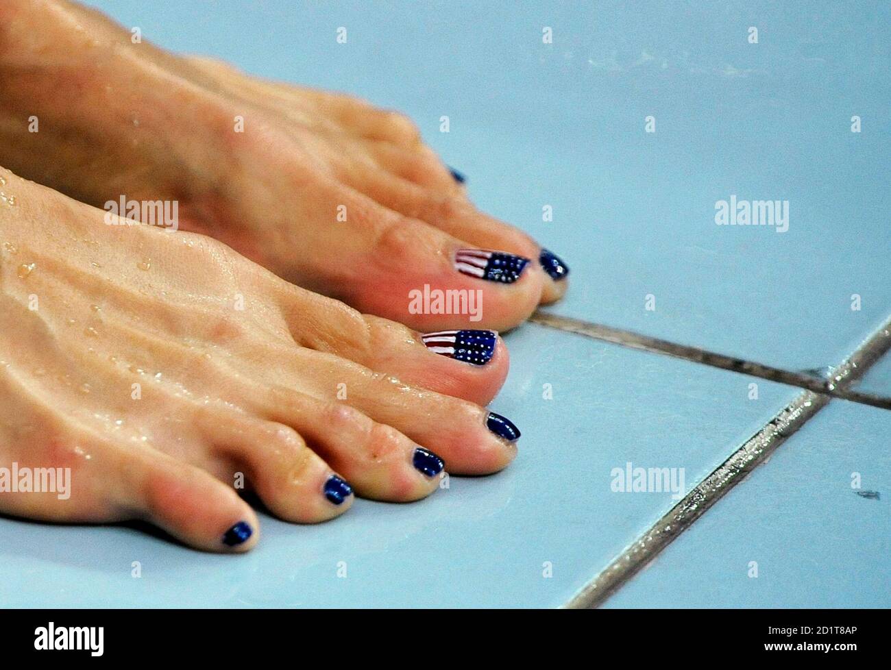 The painted toenails of Dara Torres of the U.S. are seen as she attends  swimming practice at the National Aquatics Centre, also known as the Water  Cube, ahead of the Beijing 2008