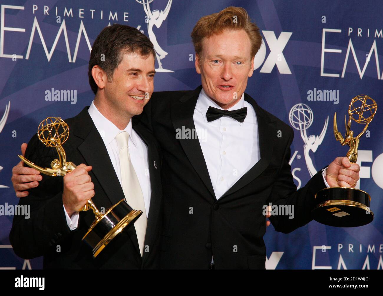 Greg Daniels (L), winner of the Emmy for Outstanding Writing for a Comedy  Series for "The Office - Gay Witch Hunt" and Conan O'Brien (R), winner of  the Emmy for Outstanding Writing
