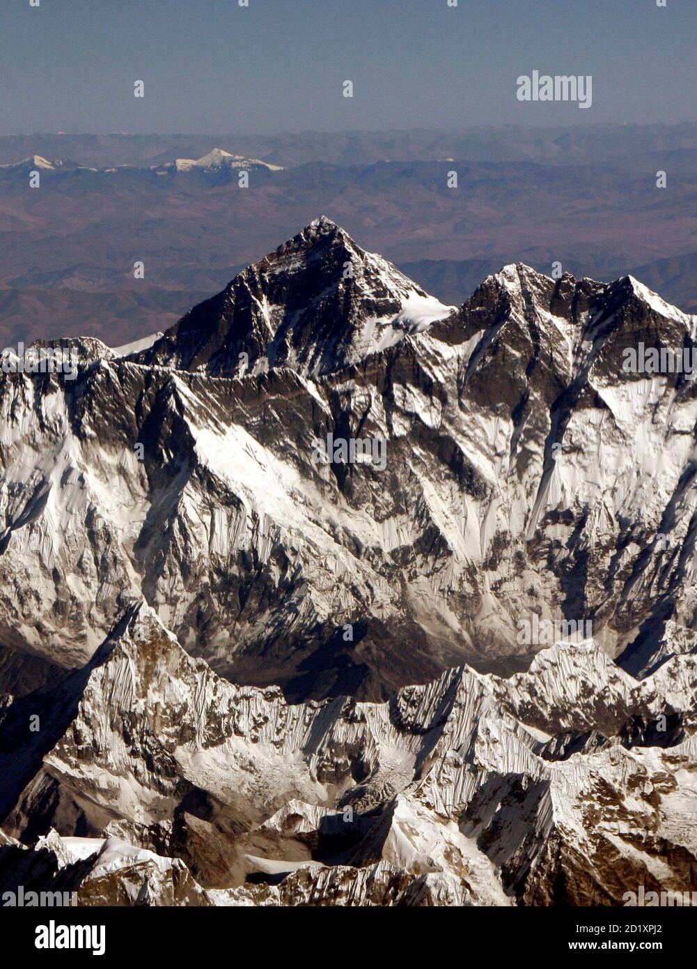 Mount Everest, the highest peak in the world, with an altitude of 8,848  meters (29,028 feet), is seen in this aerial view taken from a passenger  aircraft flying over Nepal at a