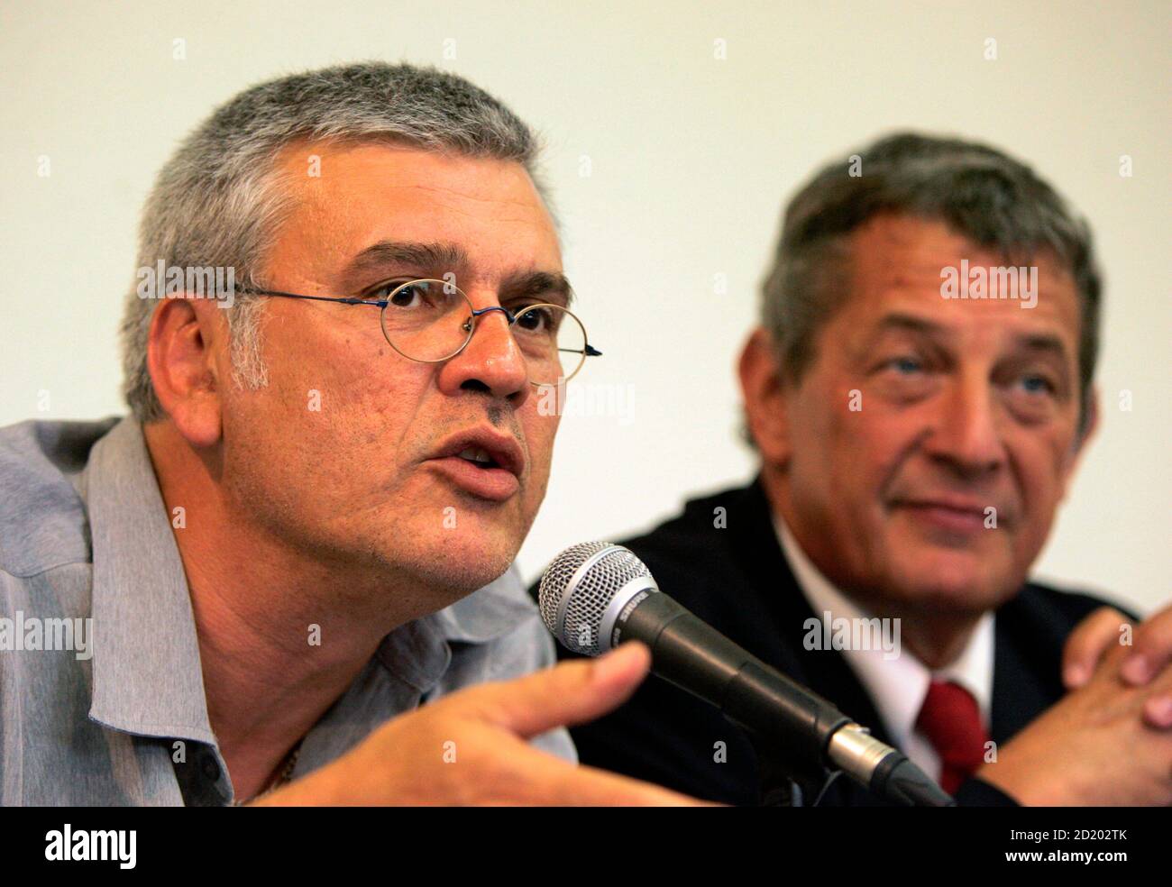 Jean-Luc Manaudou (L), the father of the French Olympic and world swimming  champion Laure Manaudou, and French swimming federation president Francis  Luyce attend a news conference in Amberieu-en-Bugey, eastern France, August  28,