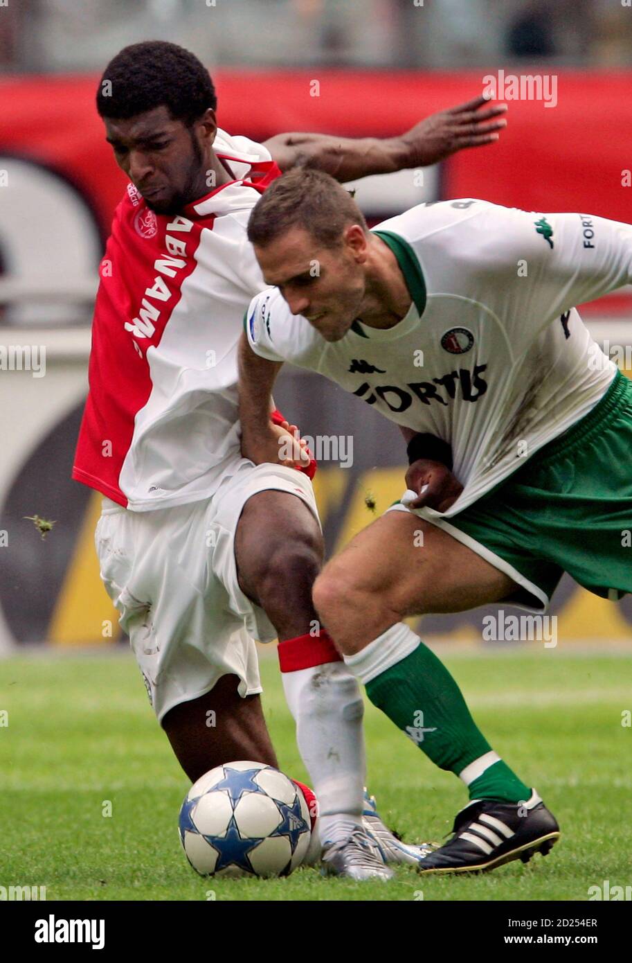 Feyenoord Rotterdam S Paauwe Battles For Ball With Babel Of Ajax Amsterdam During Dutch League Soccer Match In Amsterdam Feyenoord Rotterdam S Patrick Paauwe R Battles For The Ball With Ryan Babel Of Ajax