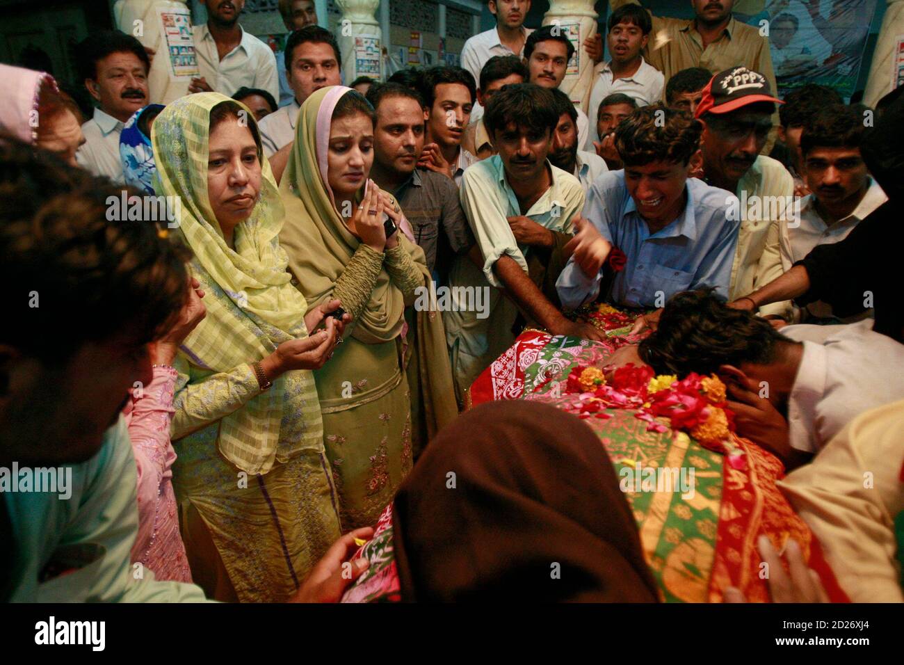 Supporters of Pakistan's slain former prime minister Zulfiqar Ali Bhutto pay their respects at his grave on his 30th death anniversary, at the family mausoleum in Garhi Khuda Bukash near Larkana April
