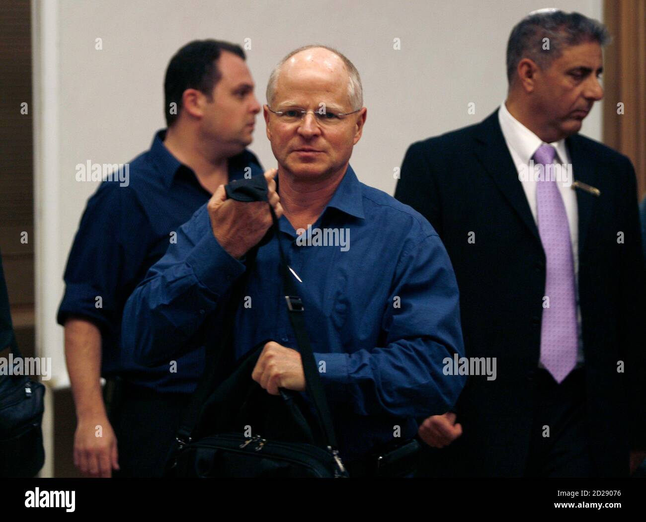 Noam Shalit (C), father of captured Israeli soldier Gilad Shalit, is seen  after his meeting with Israeli cabinet minister Yuli-Yoel Edelstein at the  Knesset, the Israeli parliament, in Jerusalem November 23, 2009.