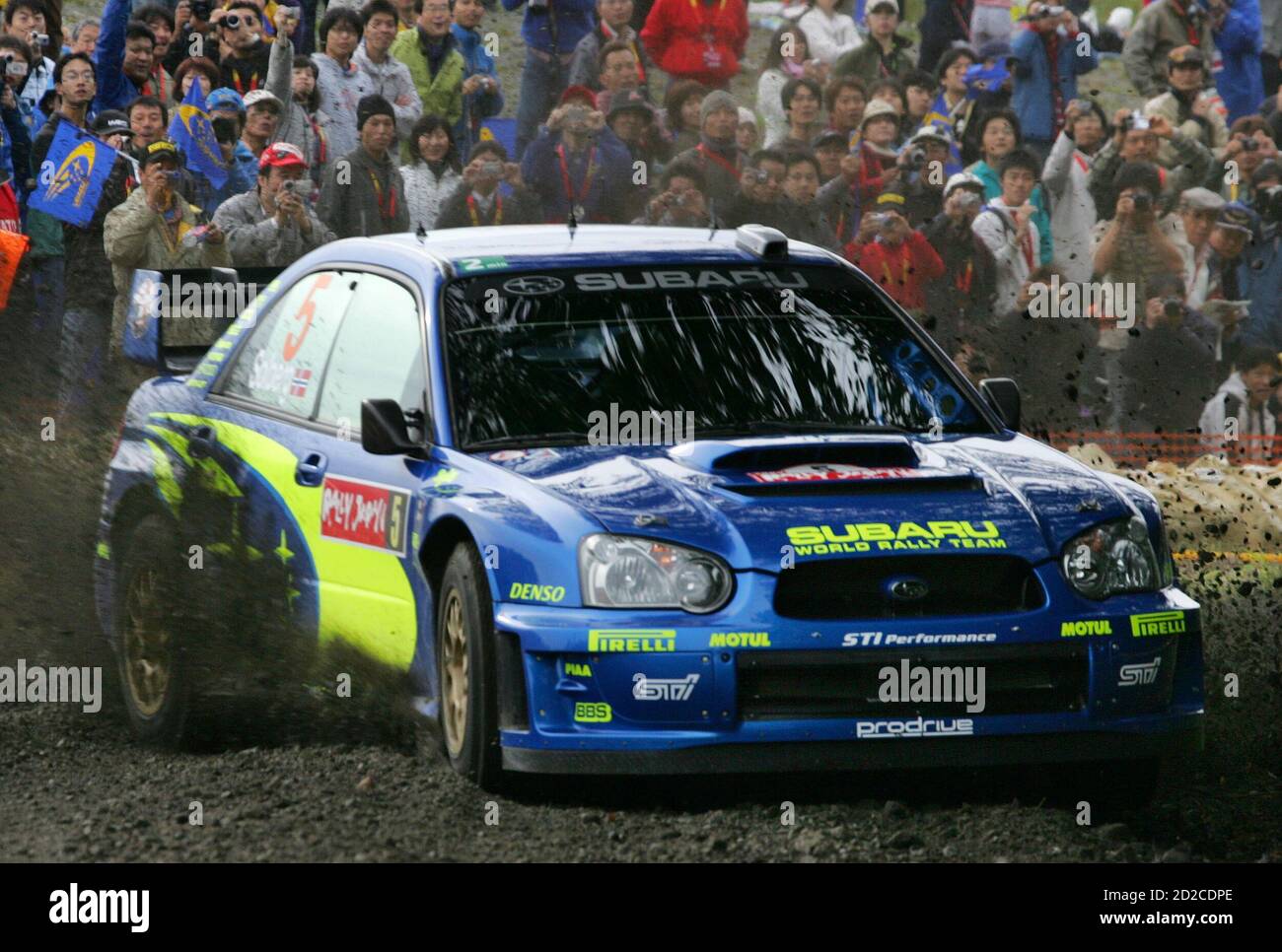 Subaru Driver Petter Solberg Of Norway Speeds Out Of A Corner At Special Stage 22 During The Third Leg Of The Rally Of Japan The 13th Round Of The 2005 Fia World