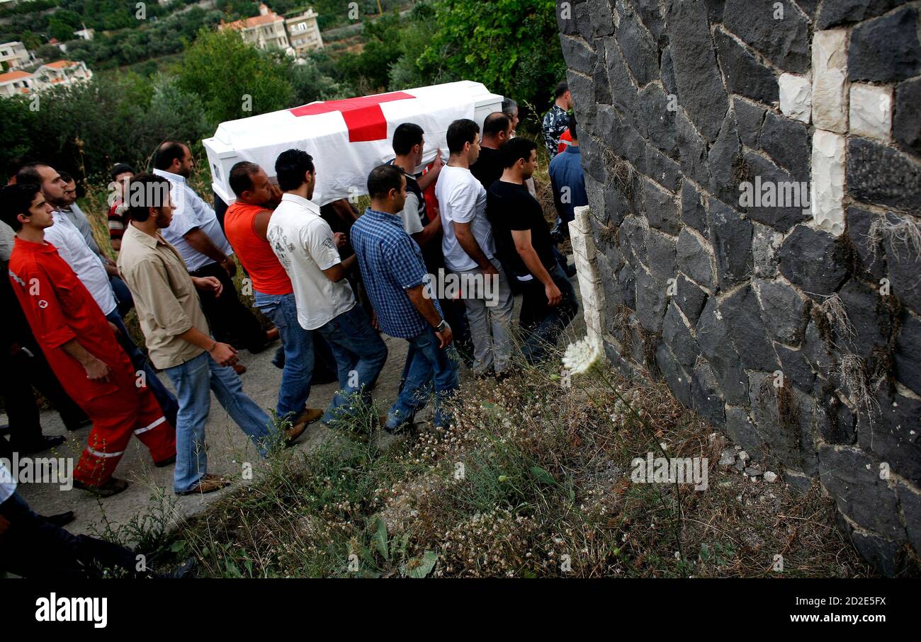 Relatives Friends And Colleagues Carry The Coffin Of Lebanese Red Cross Worker Boulos Ma Amari Who Was Killed During Fighting With Islamic Militants In The Palestinian Nahr Al Bared Refugee Camp In Sheikh Mohamad