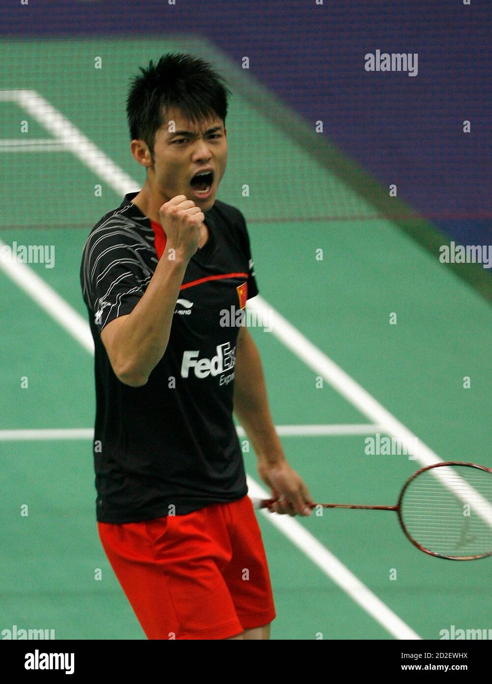 China's Lin Dan celebrates a point against compatriot Chen Jin during their  final men's singles match in the World Badminton Championships in Hyderabad  August 16, 2009. REUTERS/Arko Datta (INDIA SPORT BADMINTON Photo