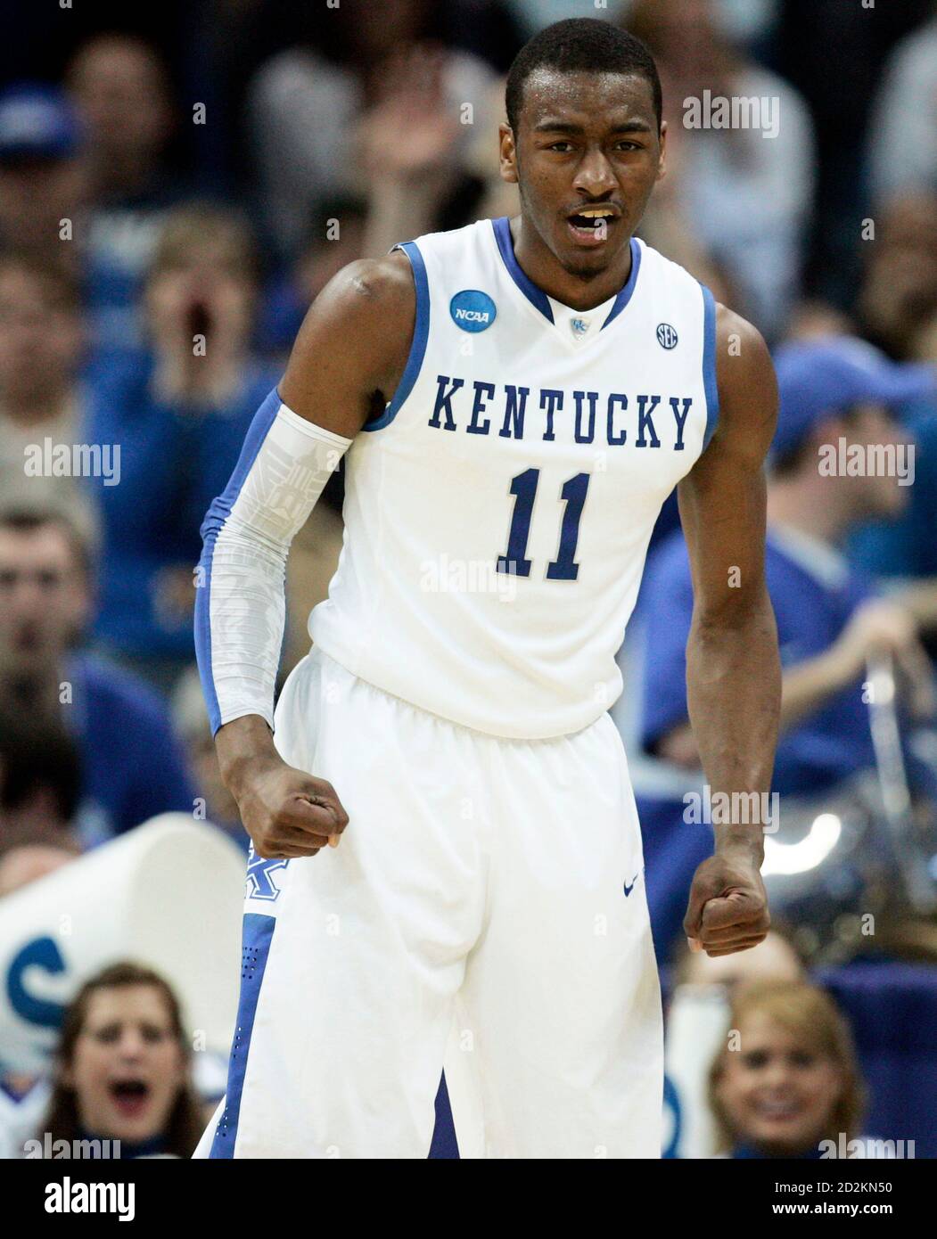 Kentucky guard John Wall reacts after scoring against Wake ...