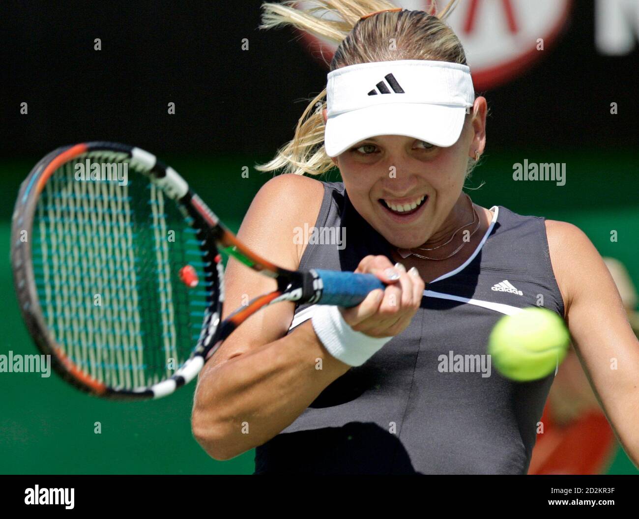 Elena Vesnina of Russia hits a return against Olga Savchuk of Ukraine during the Australian Open tennis tournament in Melbourne January 20, 2006. REUTERS/Claro Cortes IV Banque D'Images