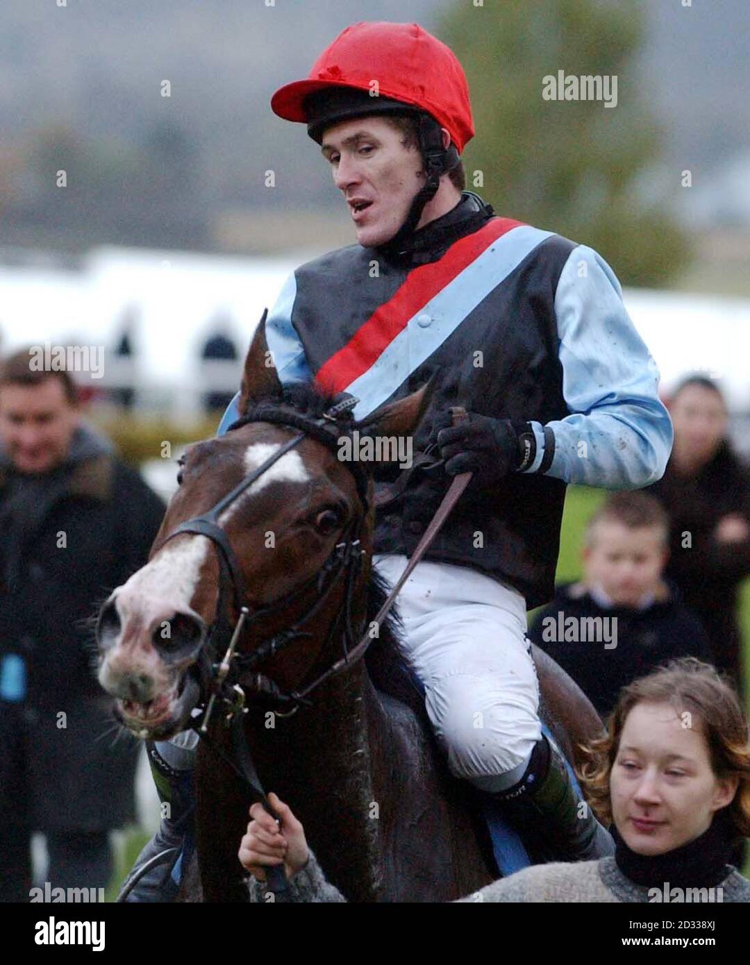 Barito avec le jockey Tony McCoy après avoir gagné dans le Tote/Racing Post 1 million dix pour suivre Chase à Cheltenham. Banque D'Images