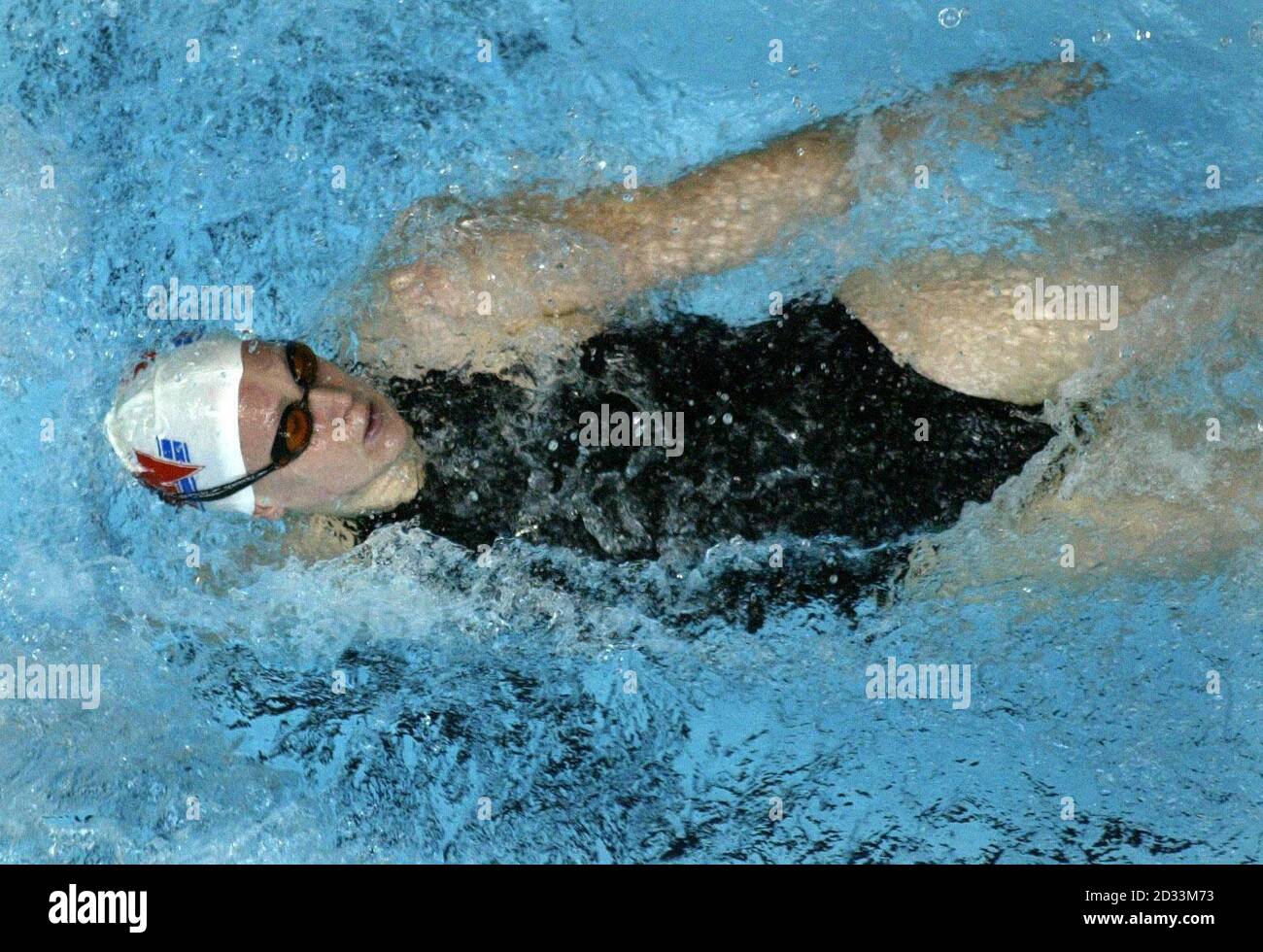 Gemma Spofforth de Portsmouth pendant sa chaleur dans le dos de 100m féminin aux championnats nationaux de natation au centre aquatique de Manchester. Banque D'Images