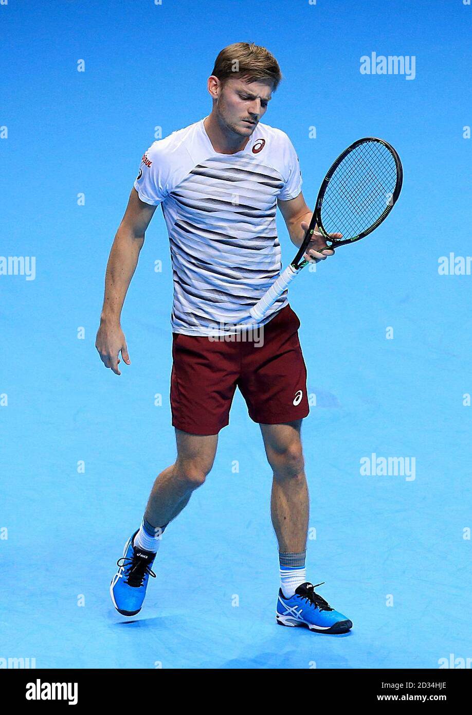 David Goffin lors de son match contre Novak Djokovic lors de la cinquième journée de la Barclays ATP World Tour finale au O2 de Londres. Banque D'Images