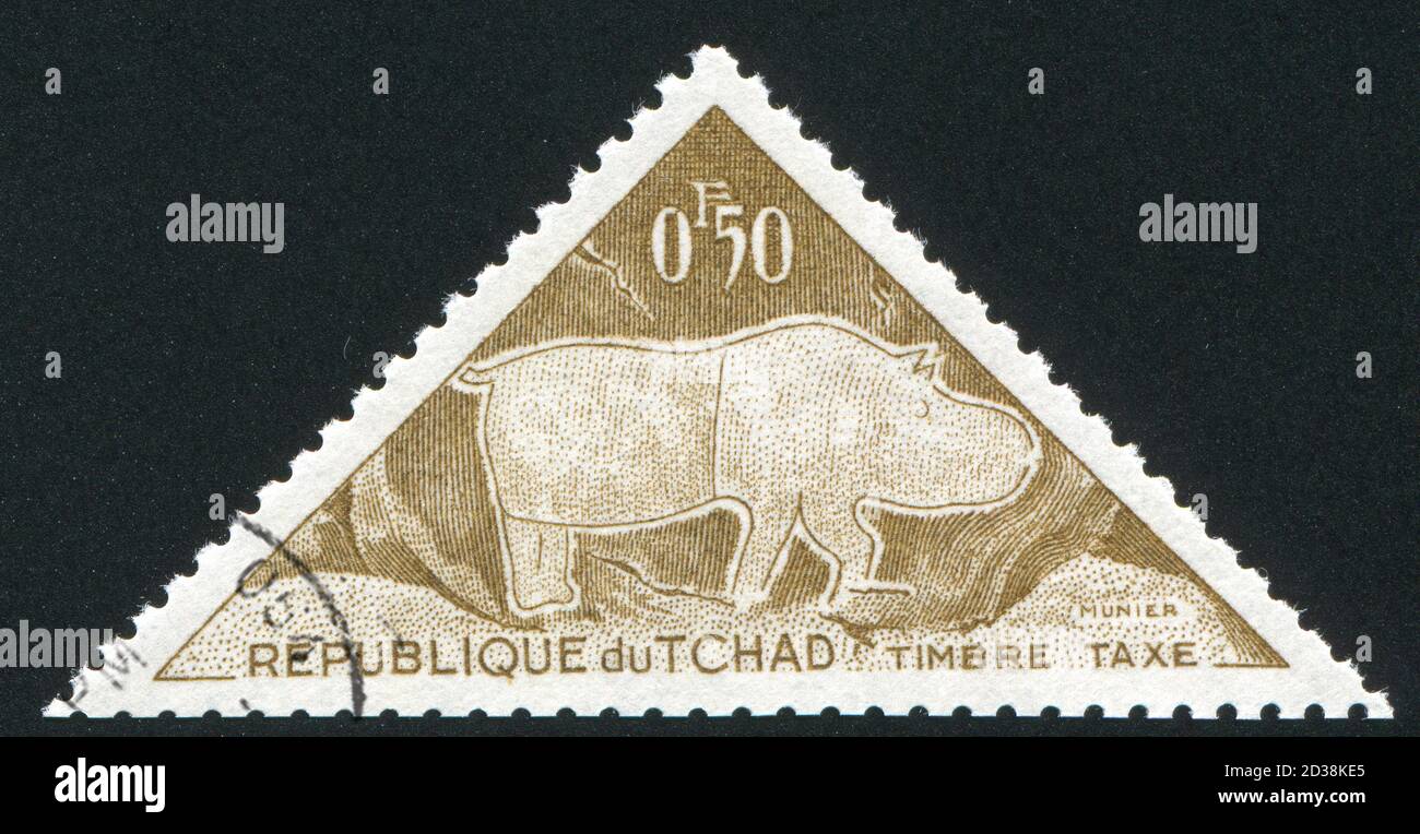 TCHAD VERS 1962: Timbre imprimé par le Tchad, montre Rhinoceros, vers 1962 Banque D'Images