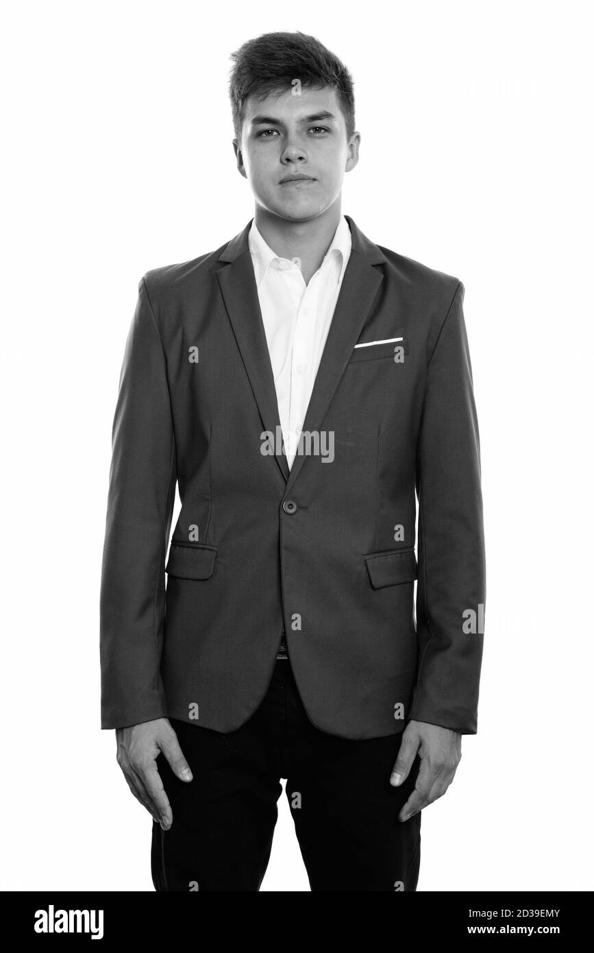 Studio shot of young handsome man standing while wearing tuxedo Banque D'Images
