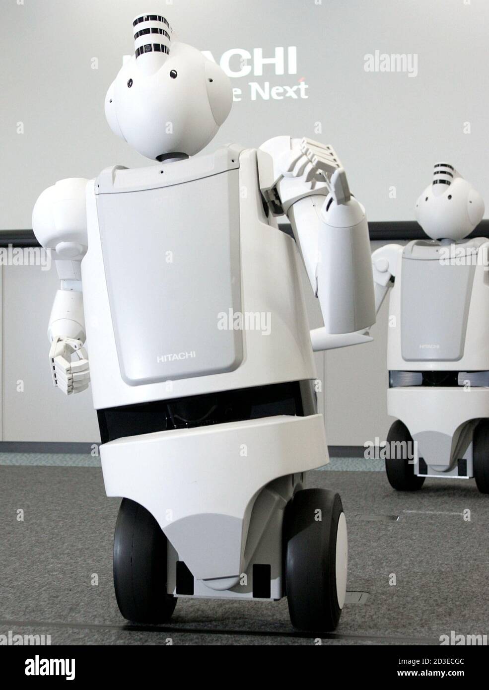 Japanese electronics conglomerate Hitachi's new humanoid robot "Emiew"  turns as it moves during a demonstration in Tokyo March 15, 2005. The  two-wheeled robot, which can move at a speed of up to