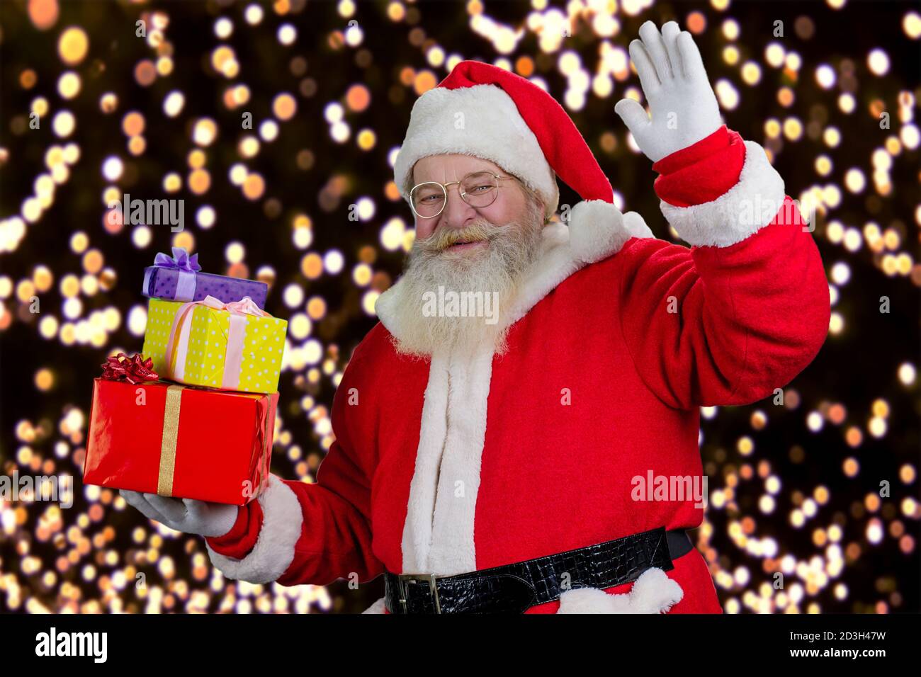Joyeux Père Noël avec des cadeaux de Noël. Banque D'Images