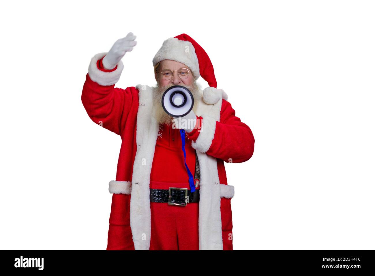 Le Père Noël en lunettes tenant le mégaphone. Banque D'Images