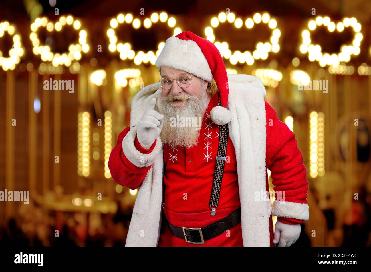 Le Père Noël gestuelle avec l'index. Banque D'Images