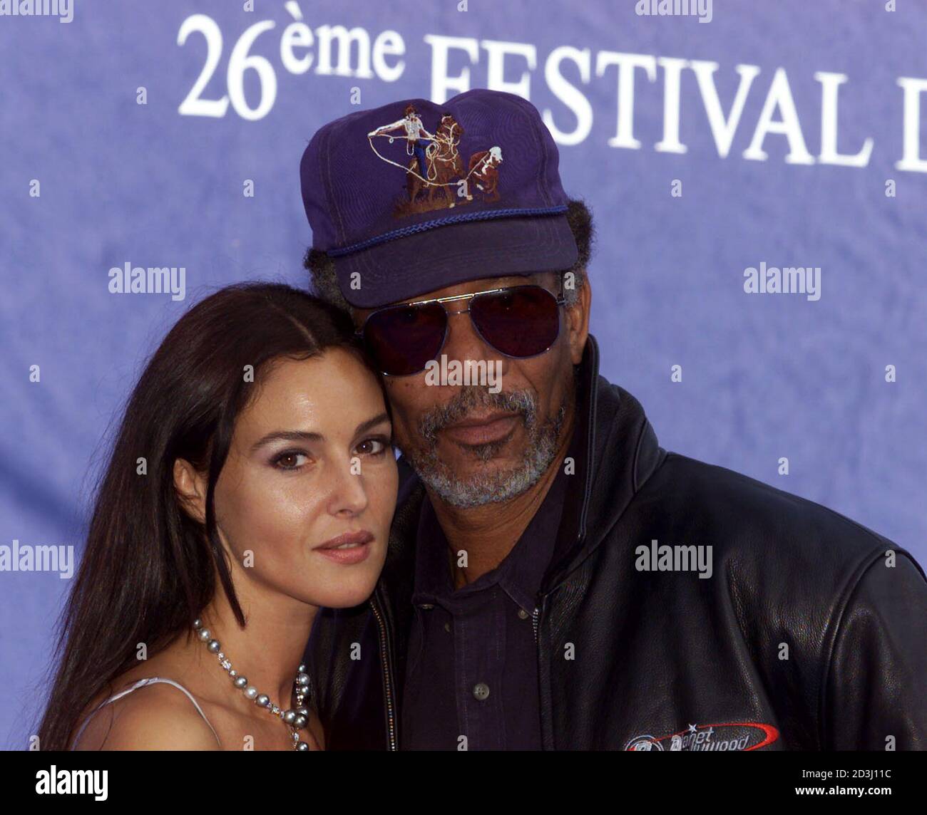 American actor Morgan Freeman (R) poses with Italian actress Monica  Bellucci (L) during a photo call prior to the screening of their film  "Under Suspicion" at the 26th American Film festival in